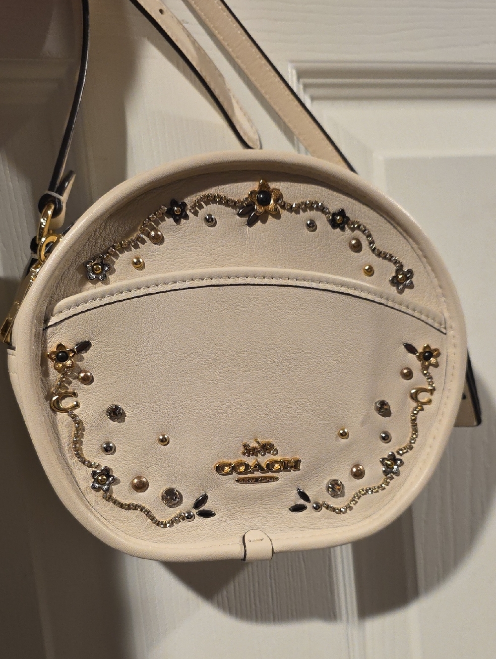 Coach Canteen Crossbody bag featuring stardust crystal rivets in the Chalk